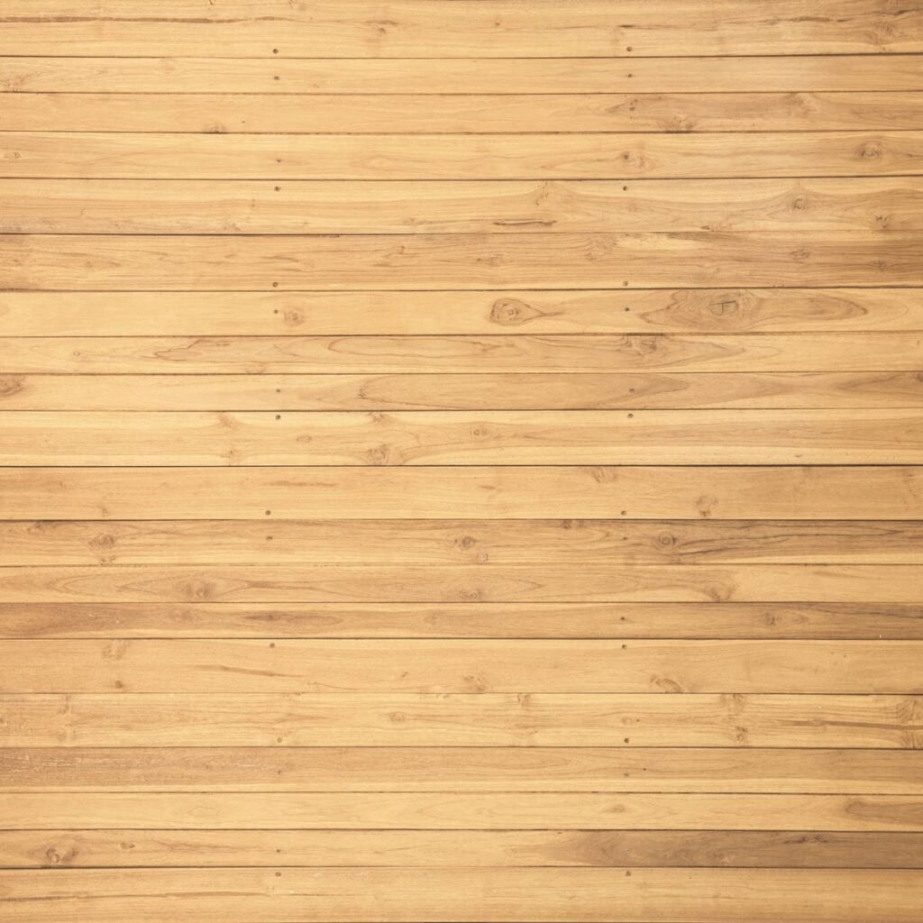 Parquet en bois brun dans une pièce