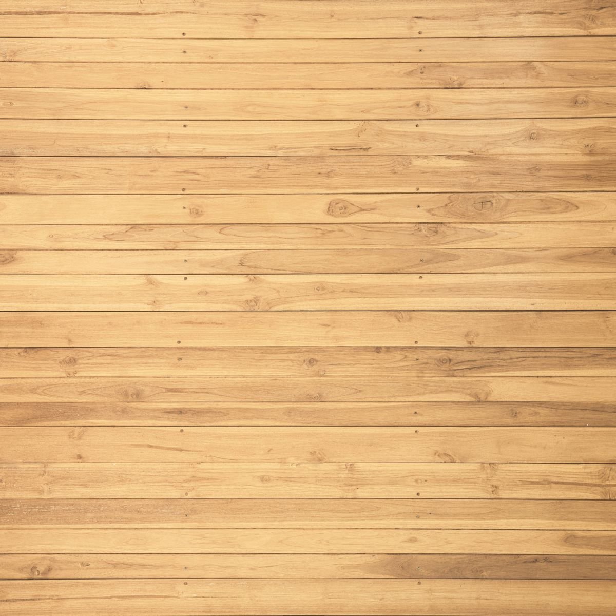 Rénovation générale à Paris et en Île-de-France Rénovation studio : parquet en bois brun dans une pièce rénovée